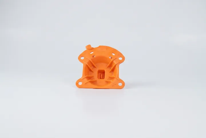 Prototypen-Bauteil aus orangem Musterharz mit Montageflansch – febana Prototypen und Kleinserie